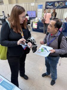 2025 BLOOME winner Kristy Daniel discusses her Research Ranger booklet with previous BLOOME winner Jeremy Hsu